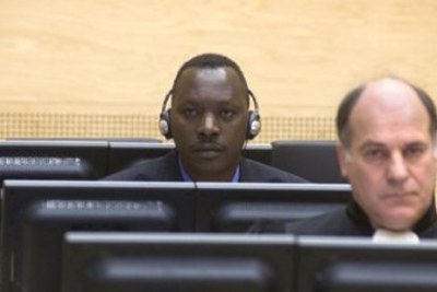 Thomas Lubanga Dyilo and his Duty Counsel, Mr Jean Flamme (Belgium) at the International Criminal Court.