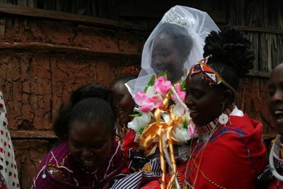 A Kenyan bride is carried to her wedding.