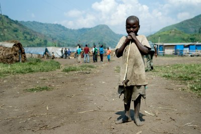 A child displaced by war in the eastern Democratic Republic of Congo: A new diplomatic partnership is working for peace in the region, says Ambassador Howard Wolpe of the U.S.