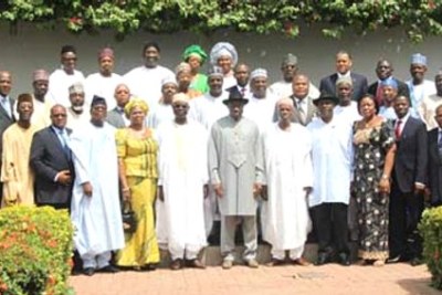 Acting President Goodluck Jonathan (middle) in a group photograph with members of the Federal Cabinet shortly after the re-constitution of the Executive Council of the Federation at the State House, Abuja.