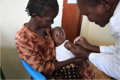 Trial participant being vaccinated, Siaya District hospital by The PATH Malaria Vaccine Initiative.