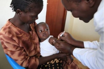 Trial participant being vaccinated, Siaya District hospital by The PATH Malaria Vaccine Initiative.
