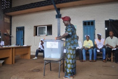 A woman casts her ballot (file photo).