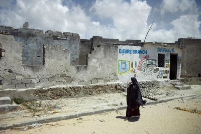 A war-ravaged street in Mogadishu: Fighting in the city's northern districts has trapped many residents in their homes (file photo).
