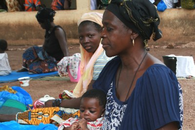 Women and children at a nutritional centre in Korhogo, northern Côte d'Ivoire.