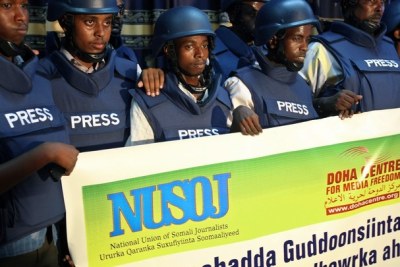Somali journalists wear bullet-proof vests to go to work (file photo):The country has been described as the most dangerous place in Africa to practice journalism.