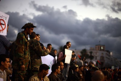 A crowd of demonstrators protest the ongoing use of weapons by rebel militias (file photo).