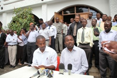 Medical Association of Tanzania President Dr Namaka Mkopi (right) addressing a press briefing.