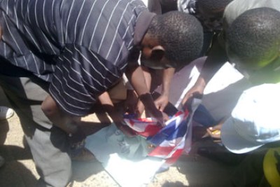 Youth burning British flag: MPs say they felt left out of the planning and mobilisation phase hence they sabotaged the protest.