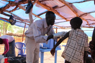 Getting a check-up (file photo): The diseases reportedly affecting the camps are malaria, typhoid, skin conditions and diarrhoea.