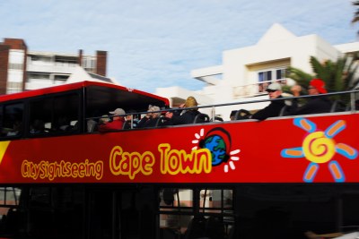 Sightseeing in Cape Town from an open-top bus.
