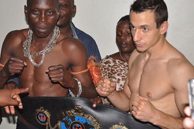 Ugandan kick-boxer Ronald Mugula and Hungarian opponent Andras Nagy.
