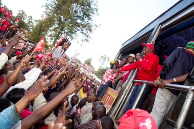 Presidential aspirant Uhuru Kenyatta addresses supporters at the Jubilee Coalition rally in Nairobi.