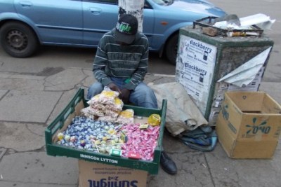 16-year-old boy sells sweets and popcorn to earn a living.