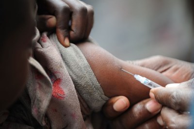 A measles vaccination.