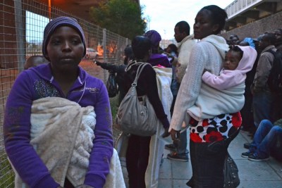 Edeline Kupara, from Zimbabwe, queueing outside the Refugee Reception Office in Cape Town (file photo).