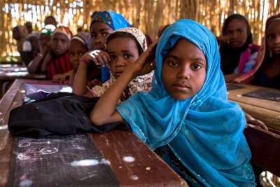 Nigerian refugee children attending school.
