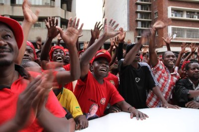 MDC-T supporters gather outside Harvest house in support of Morgan Tsvangirai.