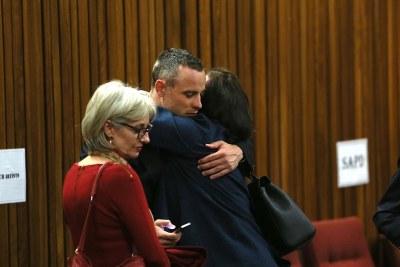 Paralympian Oscar Pistorius is seen with family and friends at the high court in Pretoria.