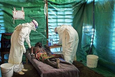 Ebola patient receives treatment.