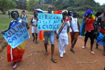 Gay and lesbian activists attend Uganda's first gay pride parade in Kampala in 2013.