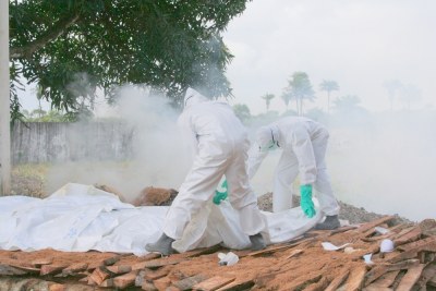 The bodies of victims of Ebola are burned.