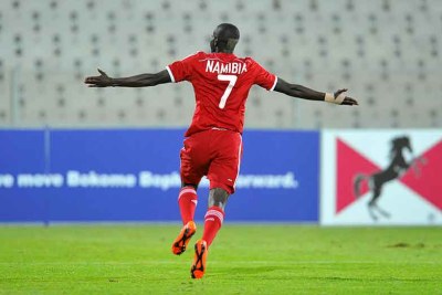 Namibian player celebrates during a match against Mozambique.