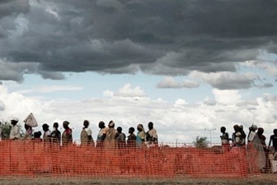 Victims of South Sudan's civil war: Civilians wait to collect their rations at a United Nations facility.