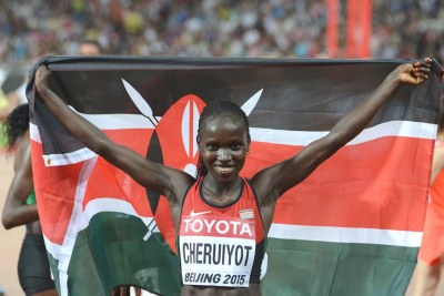 Vivian Cheruiyot,  world champion of the 10,000 meters, celebrates at the World Athletics Champs in Beijing.