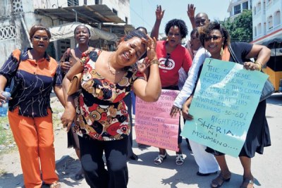 Teachers protest outside the Kenya National Union of Teachers offices in Mombasa on September 3, 2015.