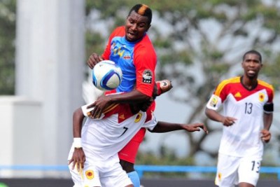 Angola and DR Congo in action during 2016 CHAN Group B match in Rwanda.