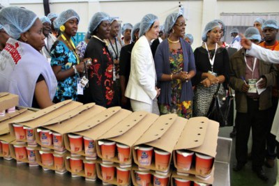 First Lady Grace Mugabe showing her products.