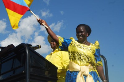 MP Catherine Lamwaka at a campaign rally with President Yoweri Museveni (file photo)