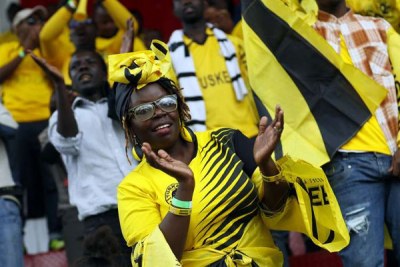 Tusker fans celebrate after their team beat AFC Leopards.