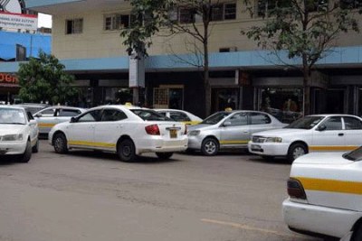 Taxicabs parked along Kimathi Street, Nairobi (file photo)