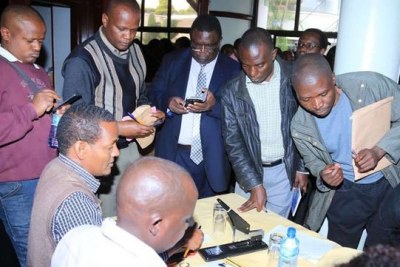 Bidders of various election materials follow proceedings during opening of tenders by Independent Electoral and Boundaries Commission (IEBC) on November 17, 2016 at Nairobi Safari Club. IEBC wants a petitioner pushing for the cancellation of a Sh2.5 billion ballot paper printing tender to deposit Sh250 million before the case can start.