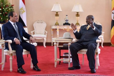 Sisi (left) and Museveni (right) held talks in Entebbe, Uganda