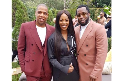 Tiwa Savage with Jay Z and P.Diddy.