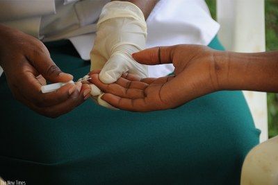 A volunteer tests for HIV (file photo).