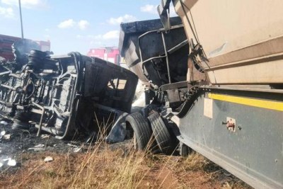 The wreckage of the minibus and a truck that collided on the R25 between Verena in Mpumalanga and Bronkhorstspruit. Twenty people, 18 of them schoolchildren, were killed.
