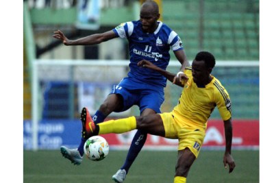 KCCA veteran Kayizzi (right) in action against Nigerian side Rivers United on Tuesday evening.