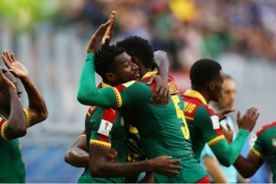 Cameroon players celebrating a goal
