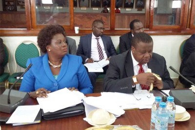 Ministers Kahinda Otafiire and Betty Amongi before the Legal and Parliamentary Affairs committee.