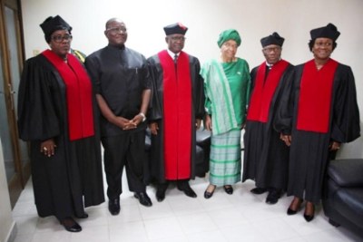 Liberian Supreme Court justices and President Ellen Johnson Sirleaf