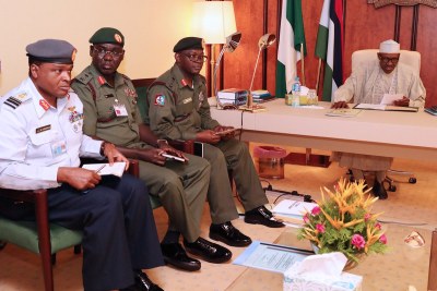 President Muhammadu Buhari (right); presiding over a security meeting with service chiefs: Chief of Defence Staff, Lt General Abayomi Olonisakin; Chief of Army Staff, Lt General Tukur Buratai and Chief of Air Staff, Air Marshal Abubakar Sadique at the State House, Abuja.