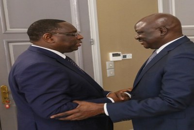 Le président Macky Sall en compagnie  du Premier ministre bissau guinéen Aristides Gomes.