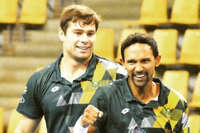 South Africa's Raven Klaasen and doubles partner Michael Venus from New Zealand
