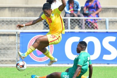 Marjory Nyaumwe of Zimbabwe challenged by Annie Kibanji of Zambia during the 2017 COSAFA Women's Championship football match between Zimbabwe and Zambia at Barbourfields Stadium, Bulawayo.