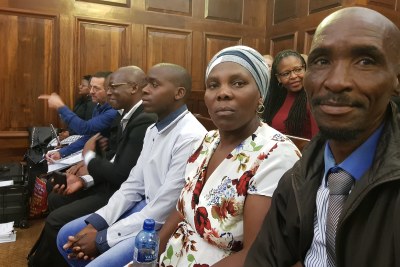From right, James, Rosina and Lucas Komape in court for the hearing.