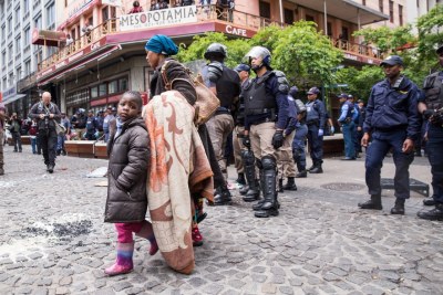 Refugees and police in Cape Town (file photo).